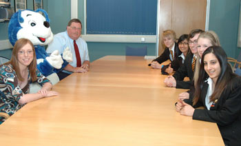 Bea, the Butterwick Hospice mascot, hiring students from the Kings Academy. On either side of Bea are Arnold Fewell and Nicola Proud from AVF Marketing