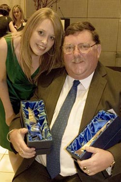 Father and daughter, Arnold and Karen Fewell, with their two awards