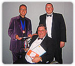 Arnold being presented with the LACA Outstanding Achivement Award